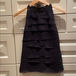 Fashionable black silk top.